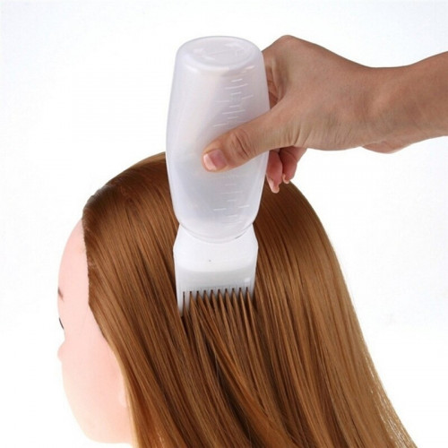 مشط توزيع زيت الشعر شفاف